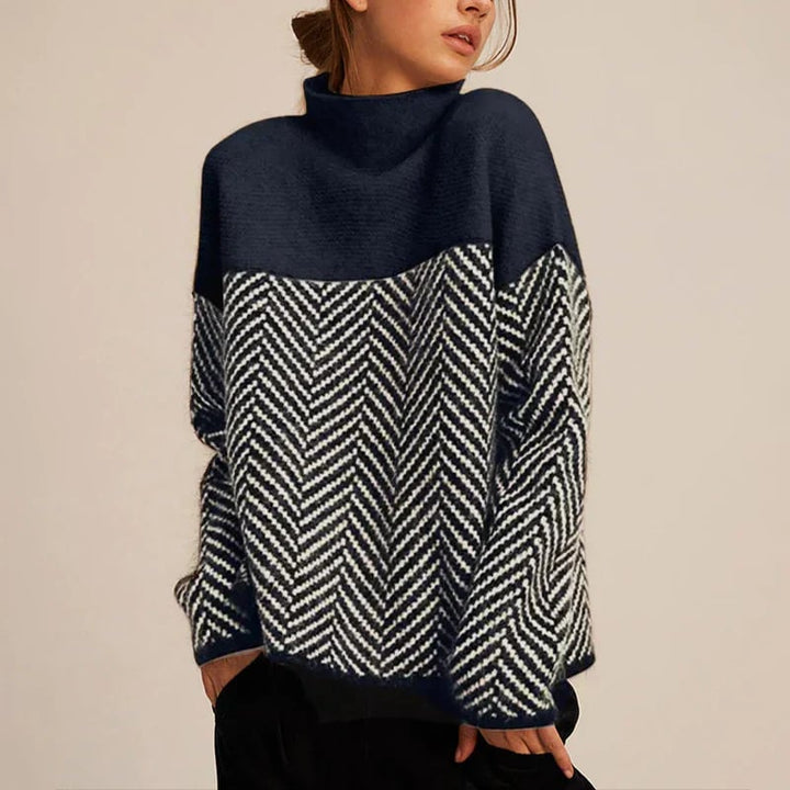 Close-up of the Vienna turtleneck sweater showing delicate chevron woven texture in beige