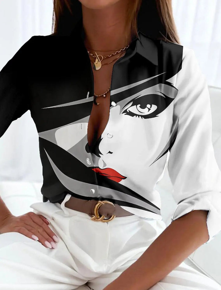 Model styled in the Viola printed blouse tucked into trousers for a business-chic look