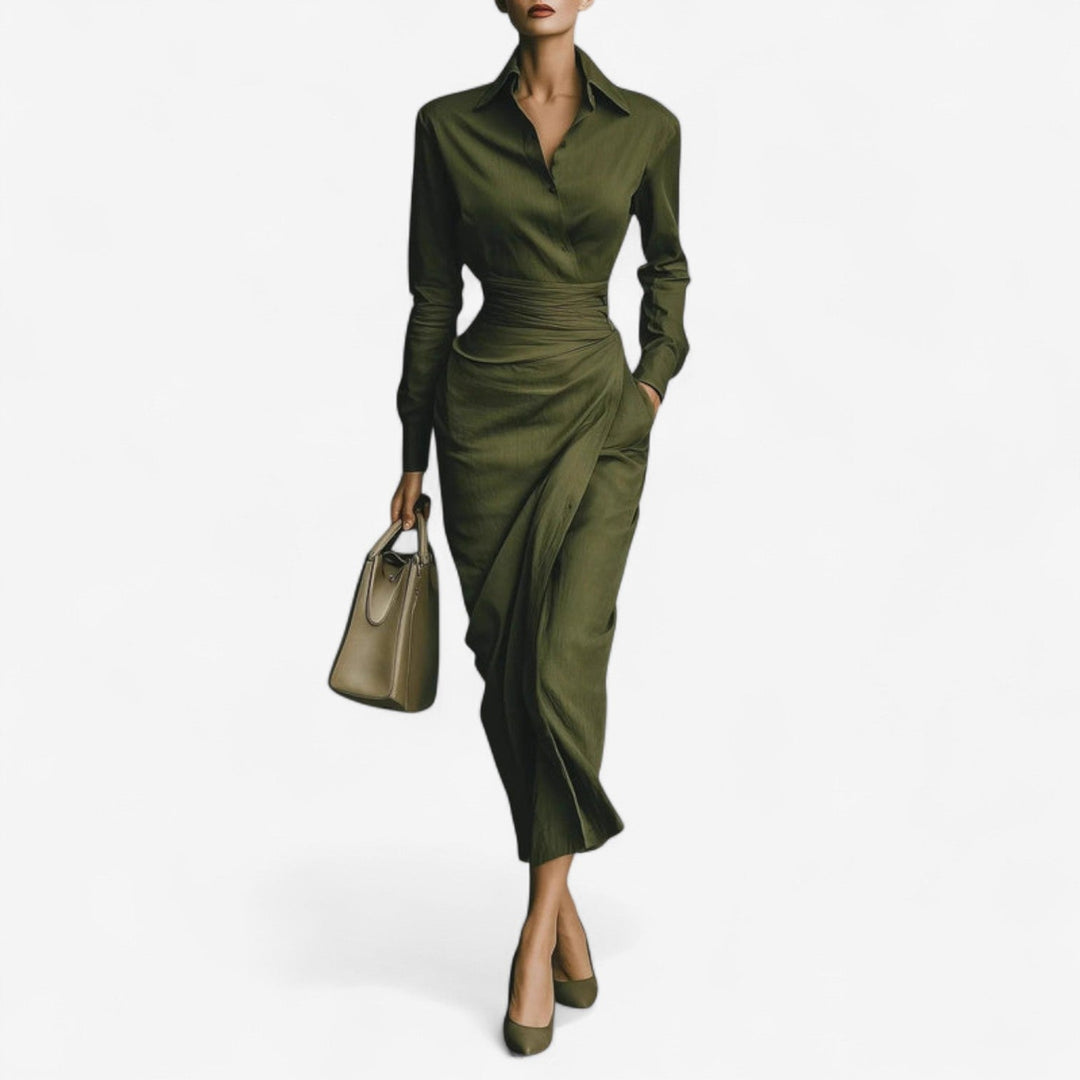 Front view of the Viola elegant wrap dress in dark green showing cinched waist and flowing skirt
