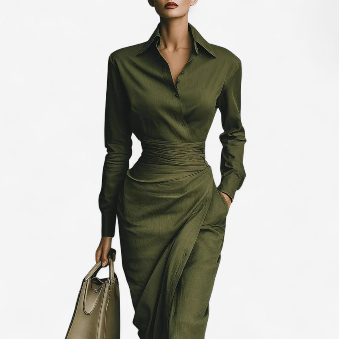 Model wearing the dark green wrap dress styled for an evening occasion