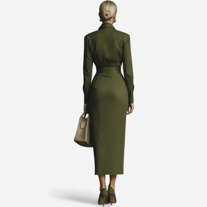 Side view of the Viola dark green wrap dress highlighting the silhouette and hem length