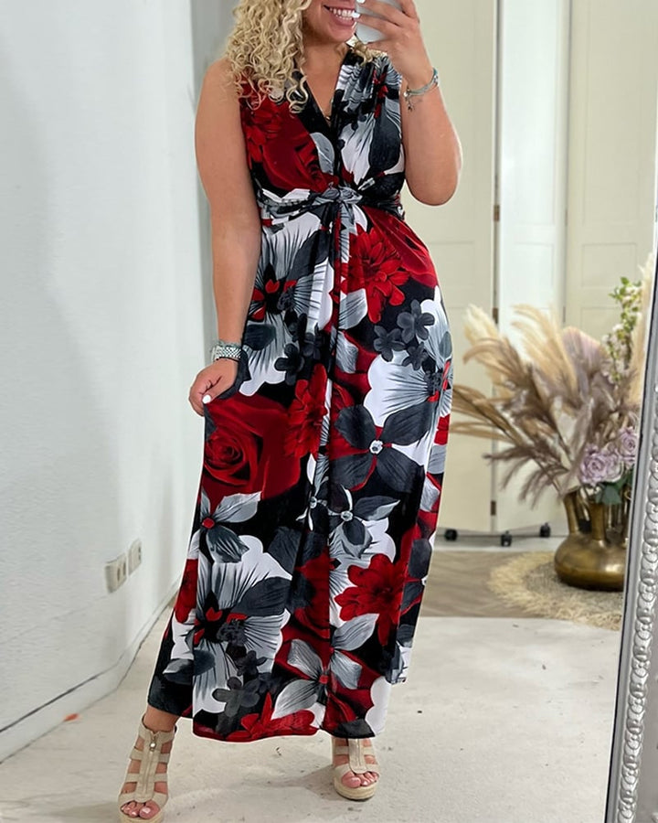 Side view of the Viola floral maxi dress showing the floor-grazing hem and flowing silhouette