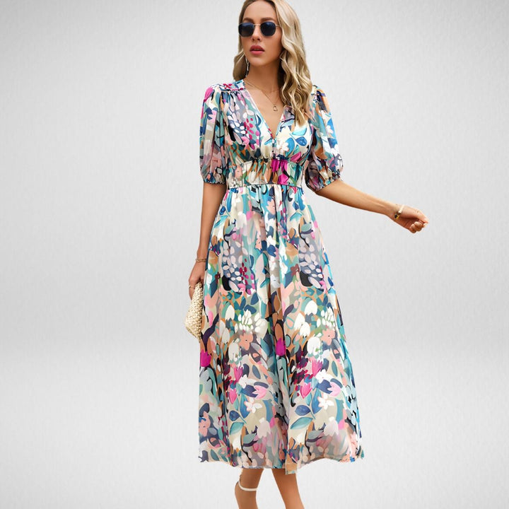 Woman in the Violet elegant dress in Red styled with heeled sandals for a dressed-up look