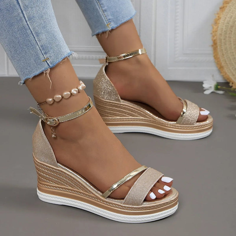 Violette women's sandals in gold colorway styled with a flowing dress for an elevated everyday look