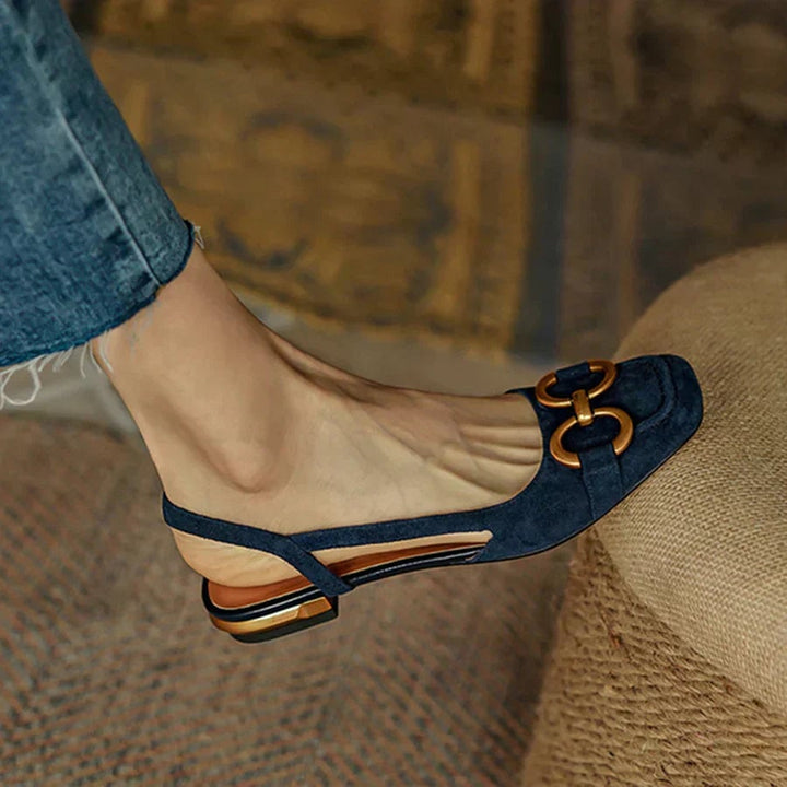 Close-up of Virginia sandals showing fine stitching detail and structured supportive base