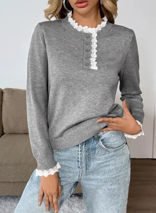 Woman wearing a gray retro-inspired knit sweater with a relaxed, flattering silhouette