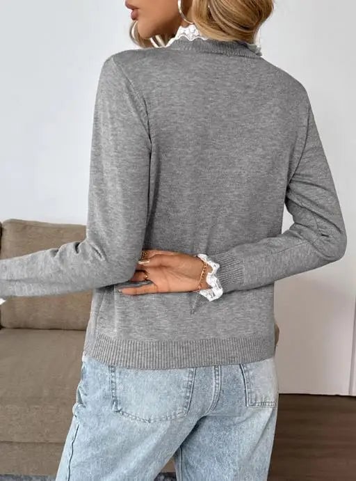 Side profile of woman in gray retro knit sweater showing graceful drape and relaxed fit