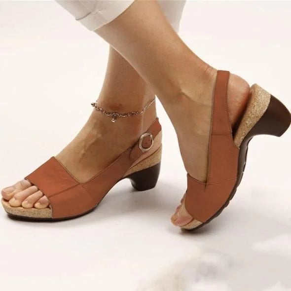 Close-up of Vivian slingback sandal buckle closure and block heel in auburn