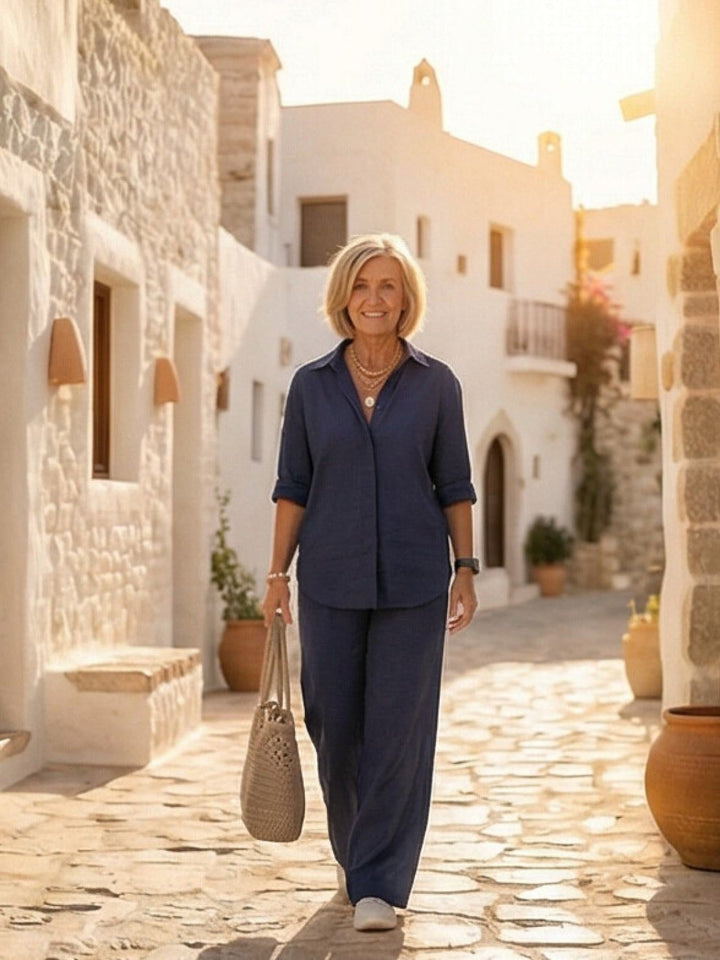 Vivian black two-piece set styled with loafers, full-length shot