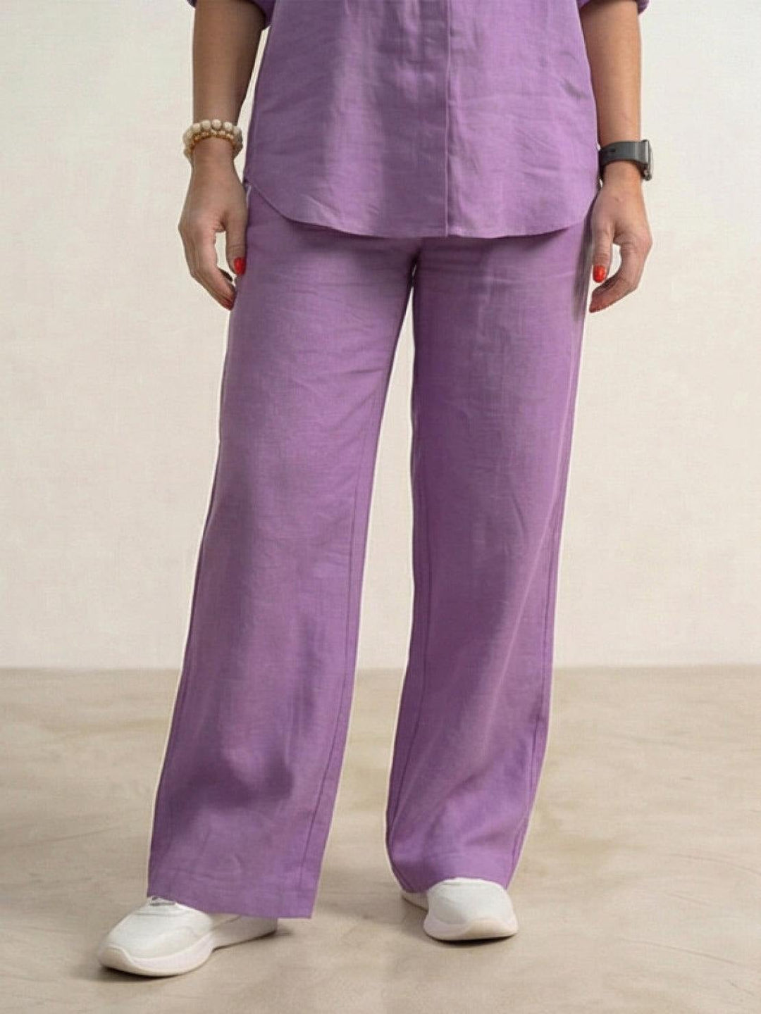 Vivian black set close-up showing drape and weight of wide-leg pants