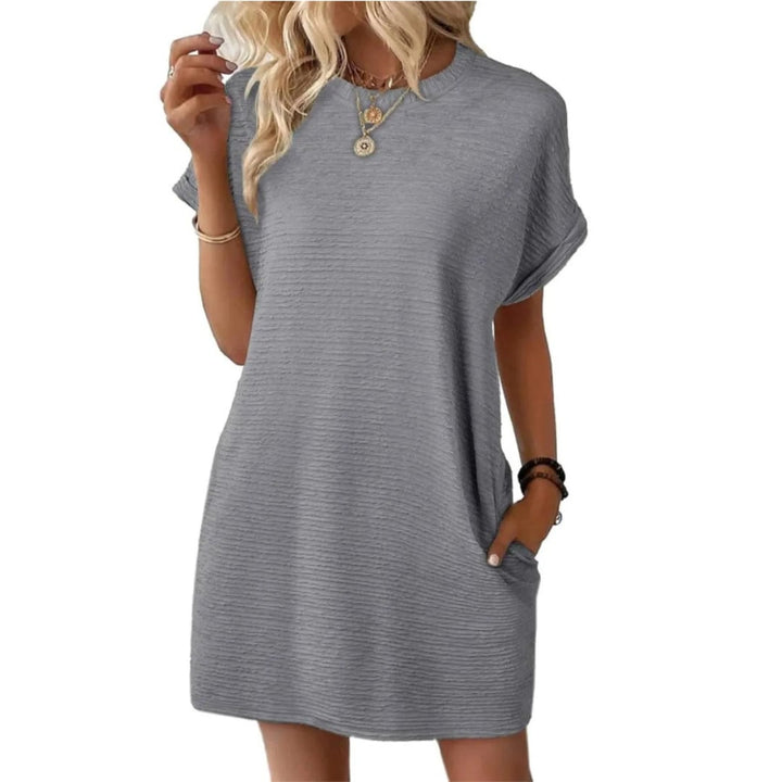 Full-length front view of the Vivid mini dress in Rose Red showing the relaxed T-shirt silhouette