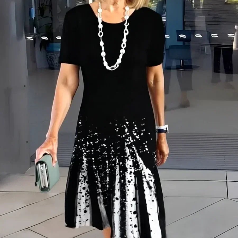 Front view of the Vivid print midi dress in colorful color-block stripe on a model