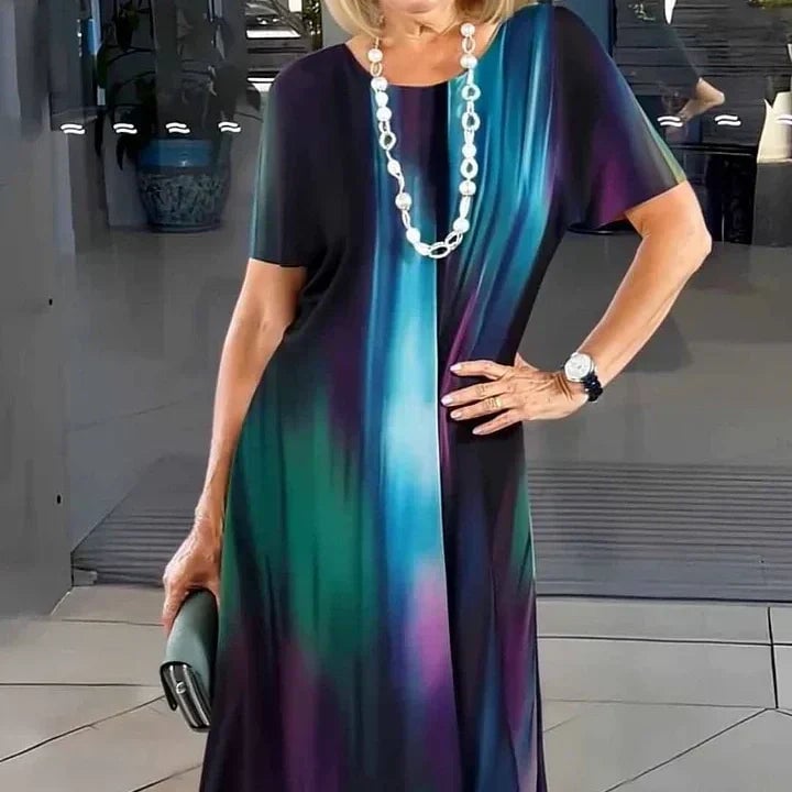 Close-up of the bold color-block stripe print and round neckline detail