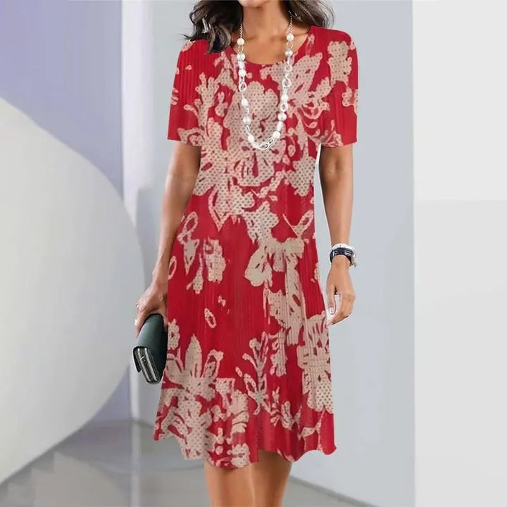Full-length front view of the Vivid midi dress in green floral print