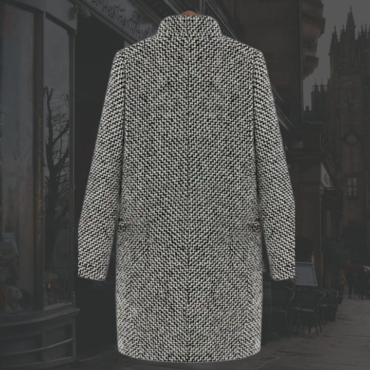 Front view of the Vivienne long winter coat showing single-button closure and deep V-neckline