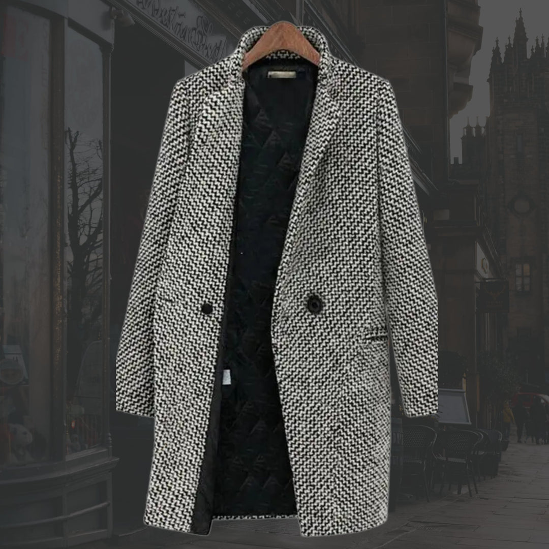 Side profile of the Vivienne long winter coat highlighting its structured yet fluid tailored shape