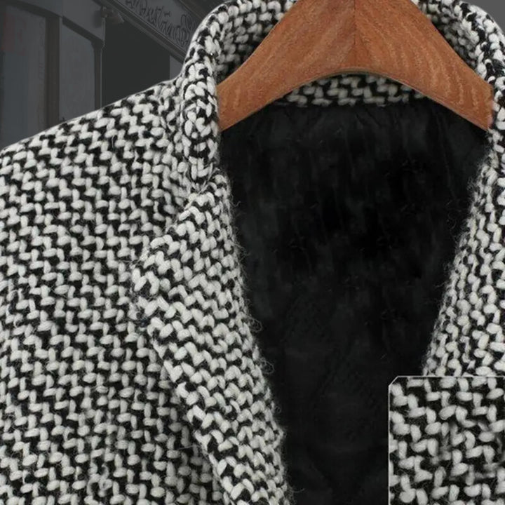 Close-up detail of the Vivienne long winter coat fabric and button closure