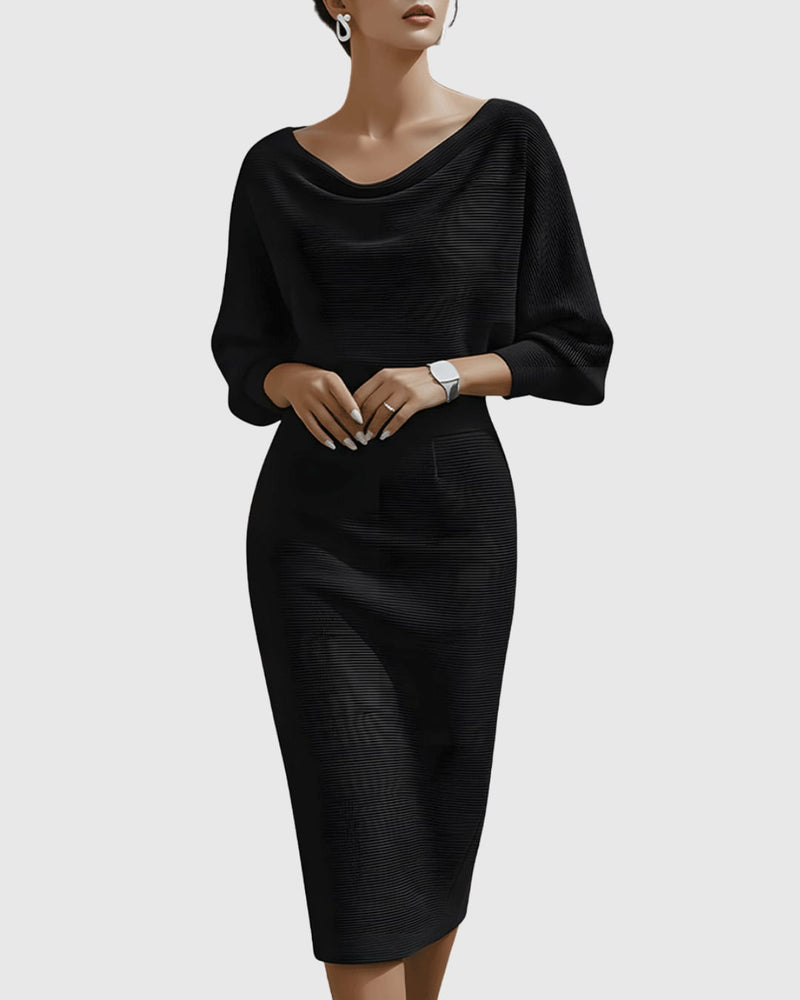 Woman wearing a black ribbed cowl neck batwing sleeve midi dress with fitted pencil skirt silhouette