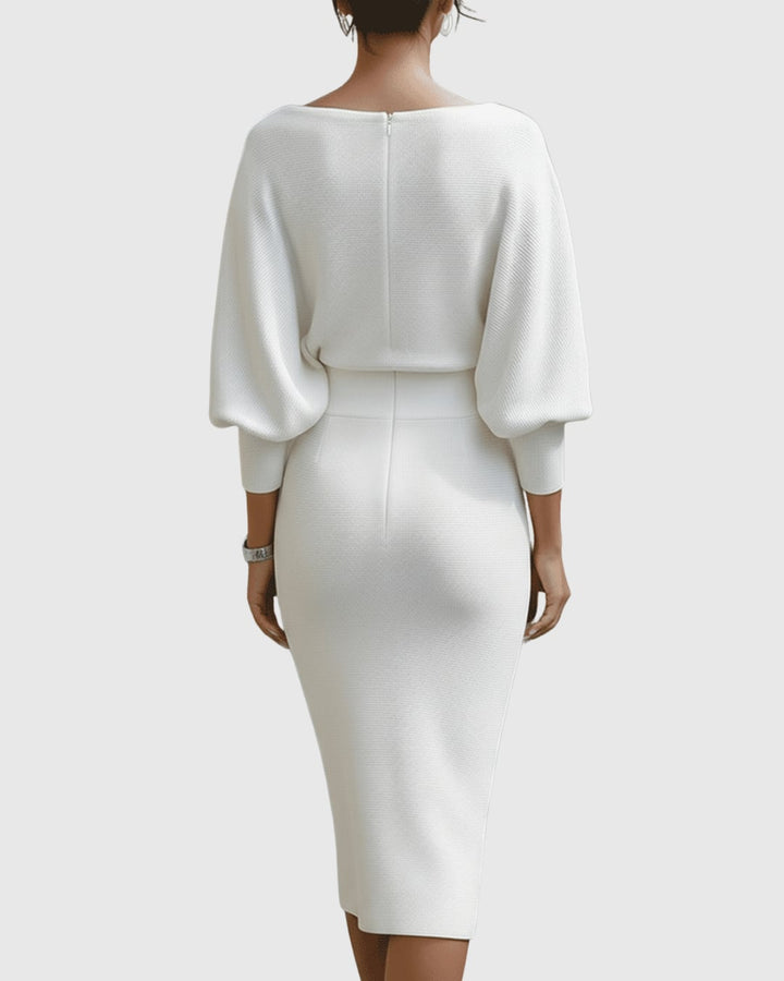 Flat lay of the Vivienne ribbed midi dress showing fabric texture and batwing sleeve shape