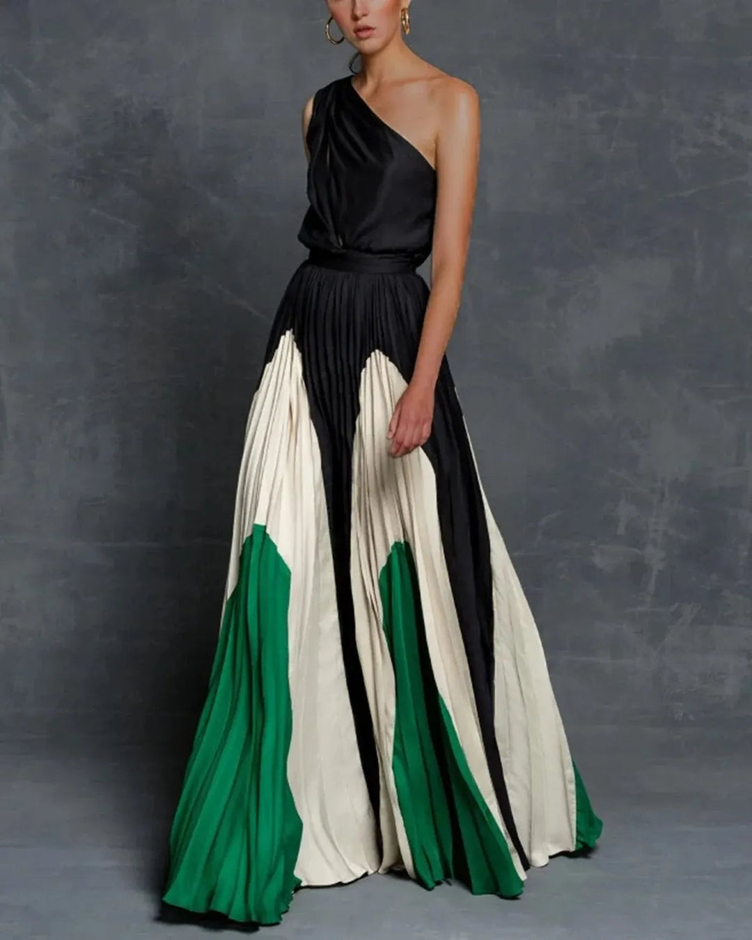 Close-up of the Vivienne maxi dress highlighting the asymmetric one-shoulder neckline and fitted bodice in yellow