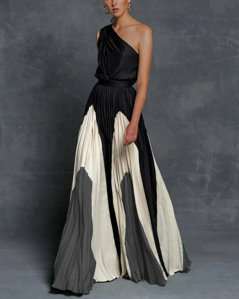 Back view of the Vivienne color block pleated maxi dress showing the flowing skirt with dramatic pleat detail