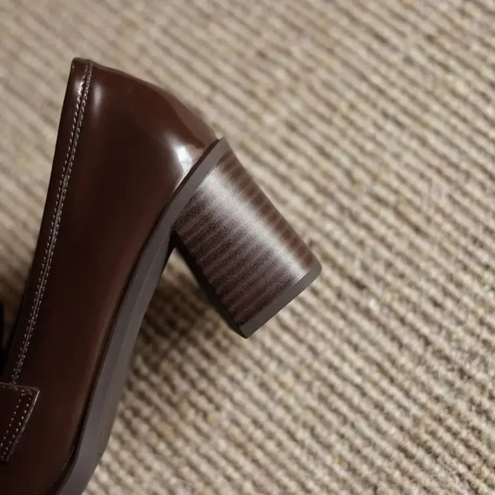 Vivienne tassel loafer pump in deep dark brown, rear view