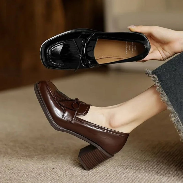 Vivienne tassel loafer pump in deep dark brown, top-down view of round toe