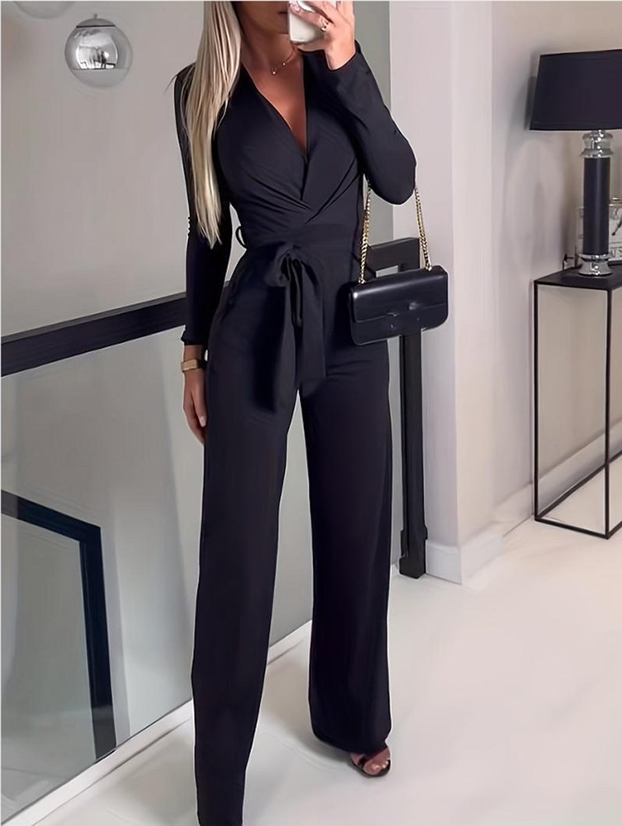 Front view of the Vivienne wide-leg jumpsuit in black showing flowing wide-leg silhouette and long sleeves