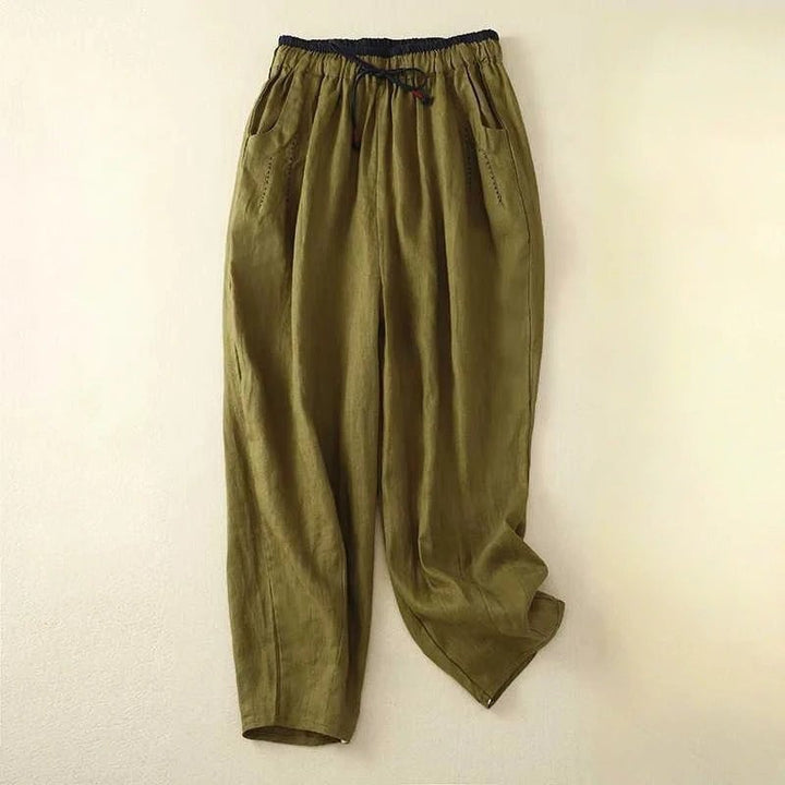 Full-length view of relaxed summer pants in navy blue showing the soft drape from waist to ankle