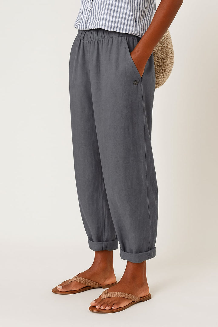 Model wearing straight-leg pants styled with a casual top, showing the versatile everyday look