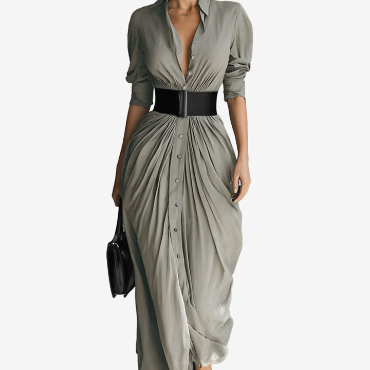 Model wearing the Waverly long sleeve dress in a flowing silhouette with tailored waist, shown from the front
