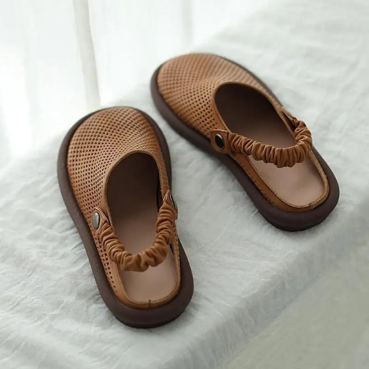 Waverly women's cushioned sandals in brown with smooth supportive straps and a padded footbed, side view