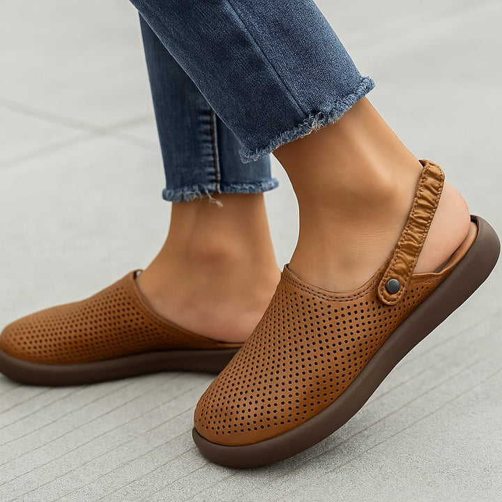 Close-up of Waverly sandal brown colorway showing cushioned footbed detail and flexible sole