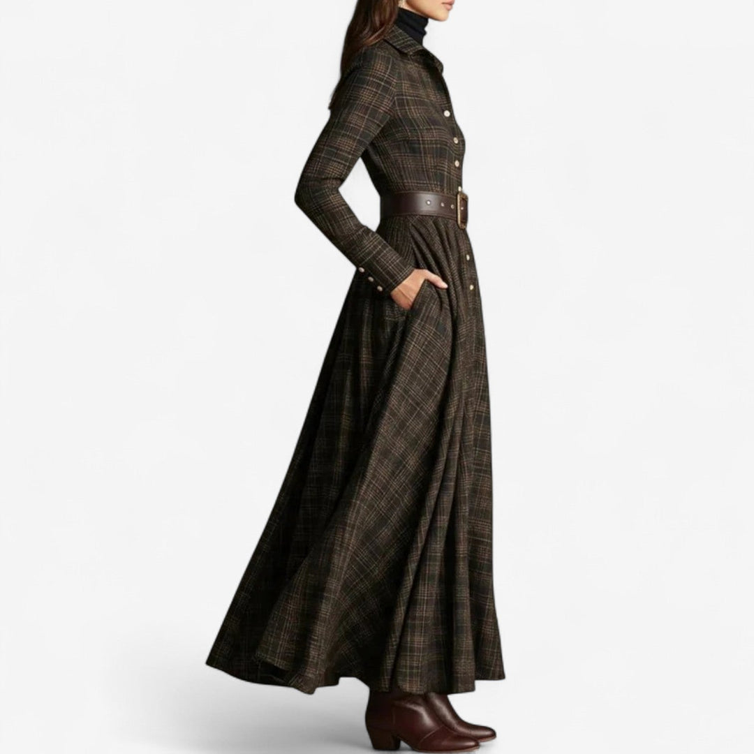 Close-up detail of the Willow maxi dress in brown showing delicate vintage-inspired fabric texture and design