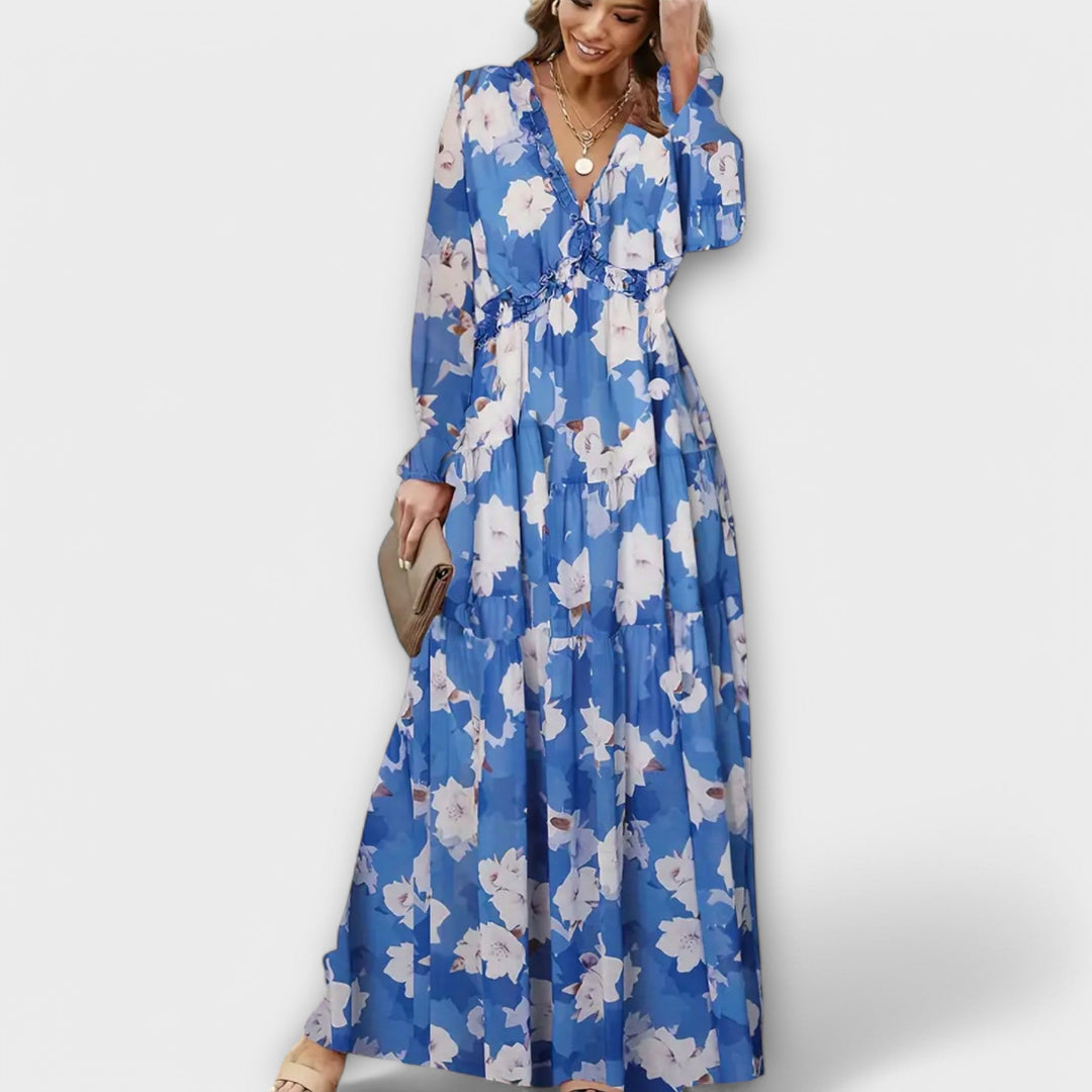 Model in a green floral V-neck maxi dress styled for a garden party