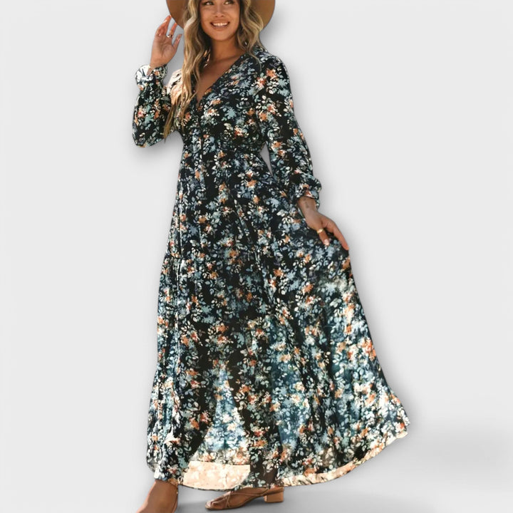 Close-up of the floral print and V-neckline detail on a lightweight maxi dress
