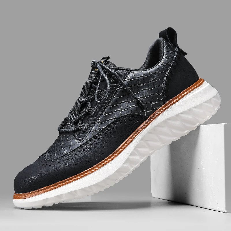 Ridge sneakers in black colorway shown from a front three-quarter angle on a clean background
