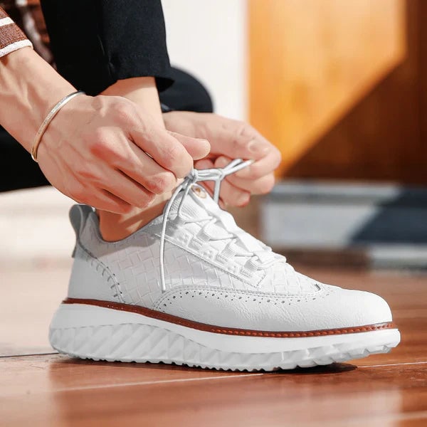 Lifestyle shot of Ridge sneakers in black worn during a casual daytime outing