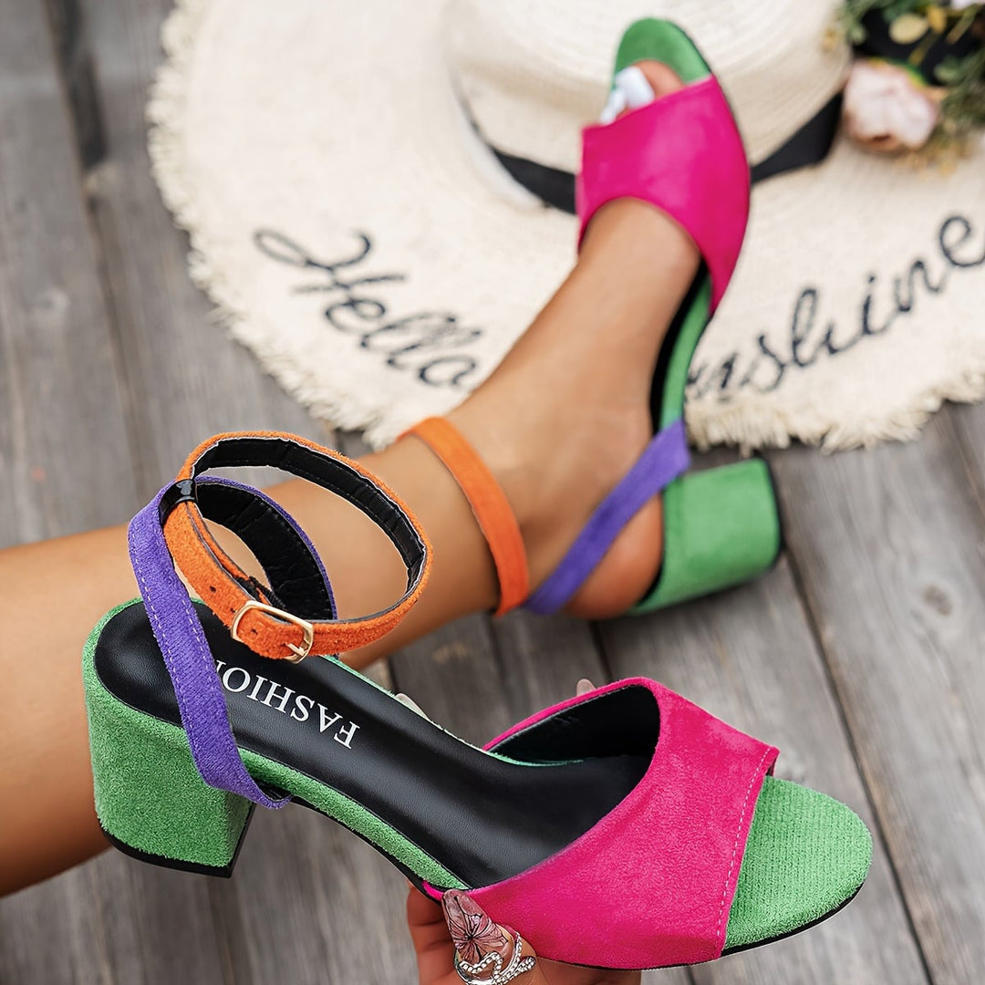 Winifred slingback heels in green displayed at an angle to show full silhouette