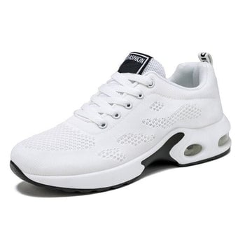 Winifred women's arch support shoes in white, clean studio shot showing flexible base