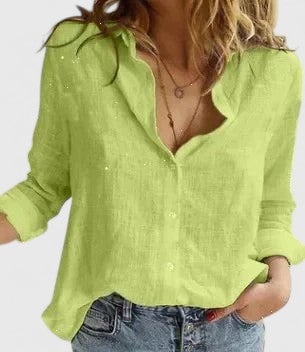 Women's floral long sleeve blouse in blue, styled loosely untucked