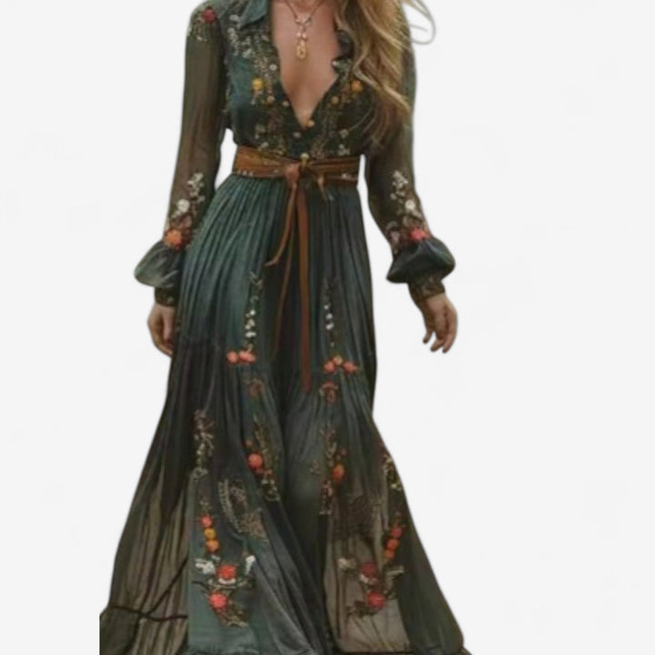 Close-up of multicolor floral embroidery on a lightweight maxi dress showing artisanal stitching detail