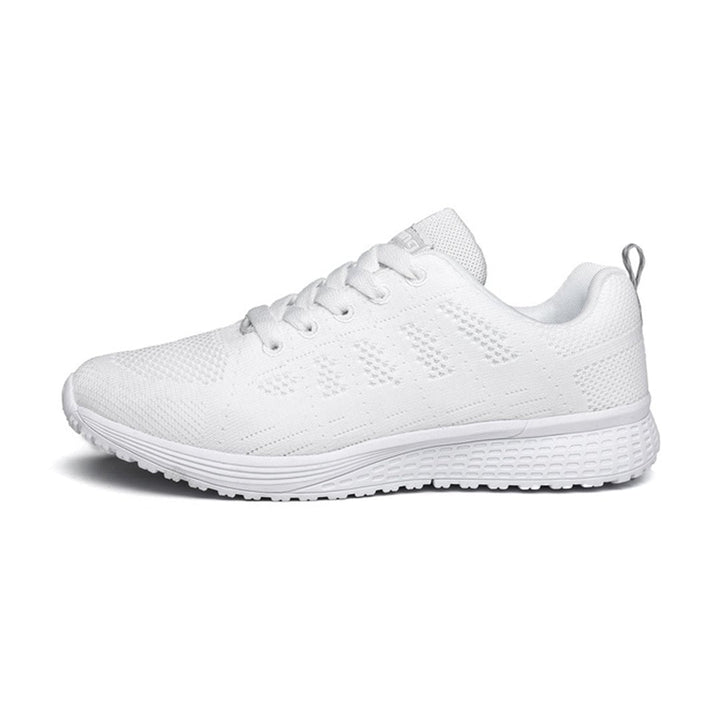 Winslow women's arch support shoes in white with ergonomic cushioned sole, side view