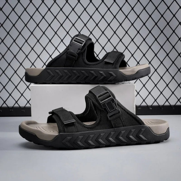 Wisteria women's sport slides in black, top-down view of slip-on silhouette