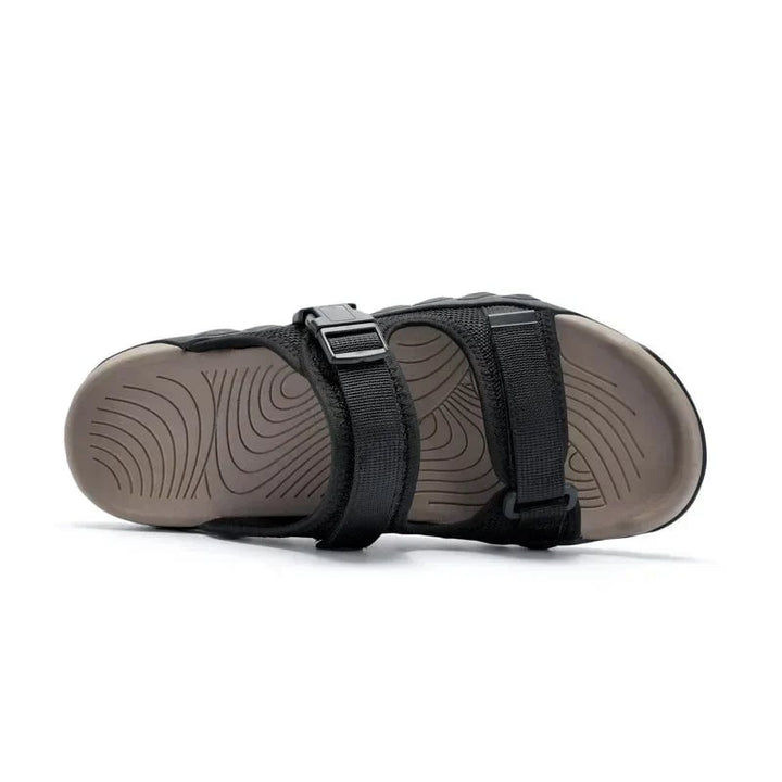 Wisteria women's sport slides in green, sole detail showing flexible construction