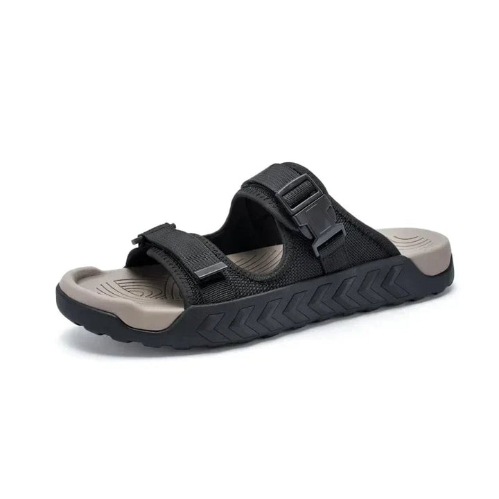 Wisteria women's sport slides in green, worn on foot showing casual styling