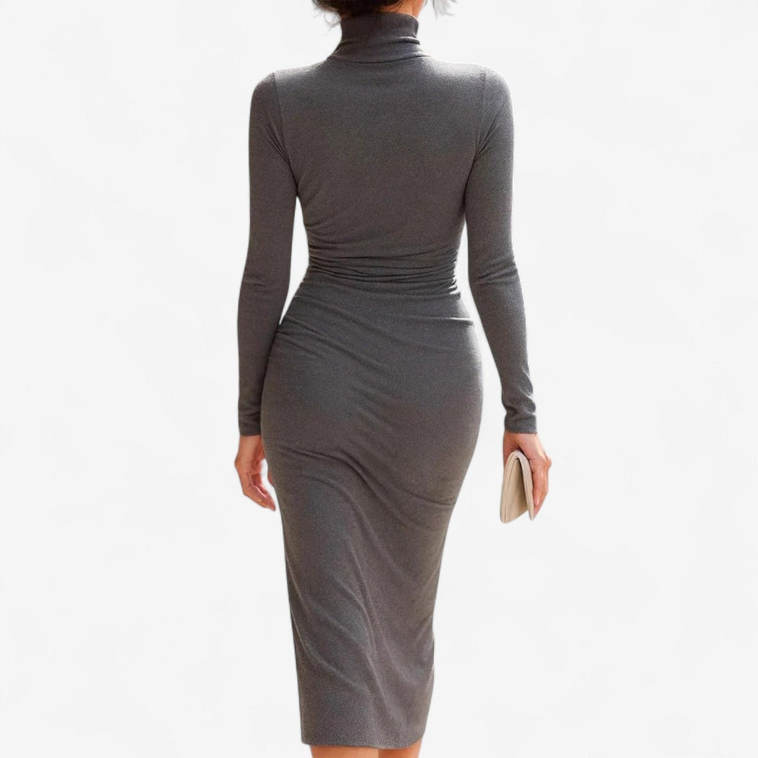 Back view of the grey fitted long dress highlighting the contoured cut and floor-length hem