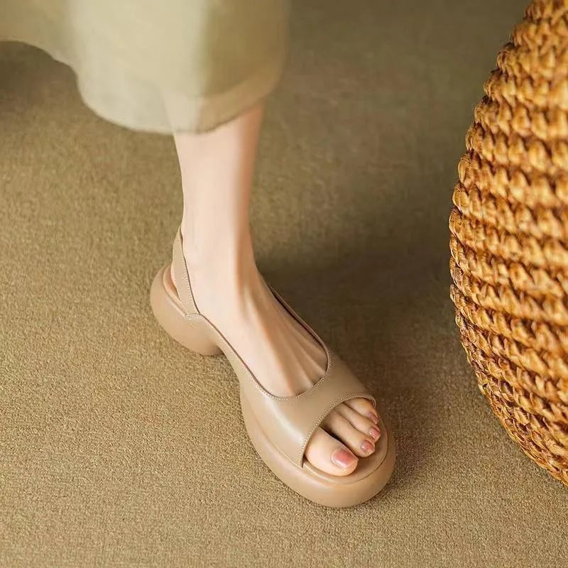 Pair of Wren platform sandals in Rose Red and White displayed side by side on white surface