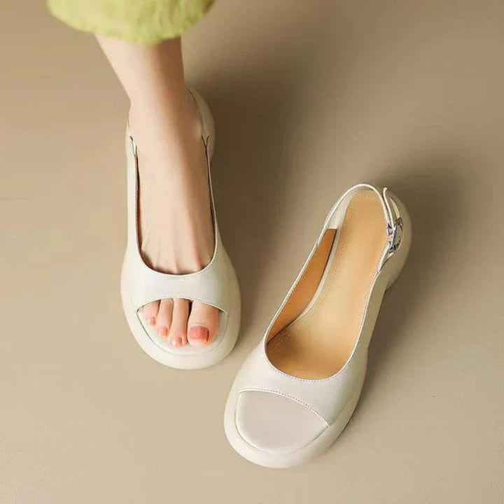 Wren women's low heel sandals in Apricot worn with linen trousers, lifestyle shot