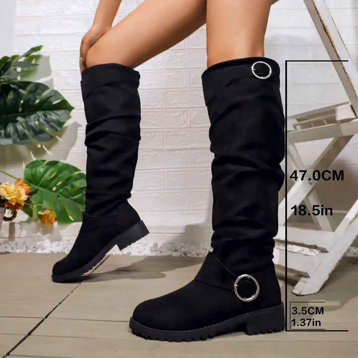 Front view of Florimay Wyn knee high boots in black with a sleek, elongated silhouette